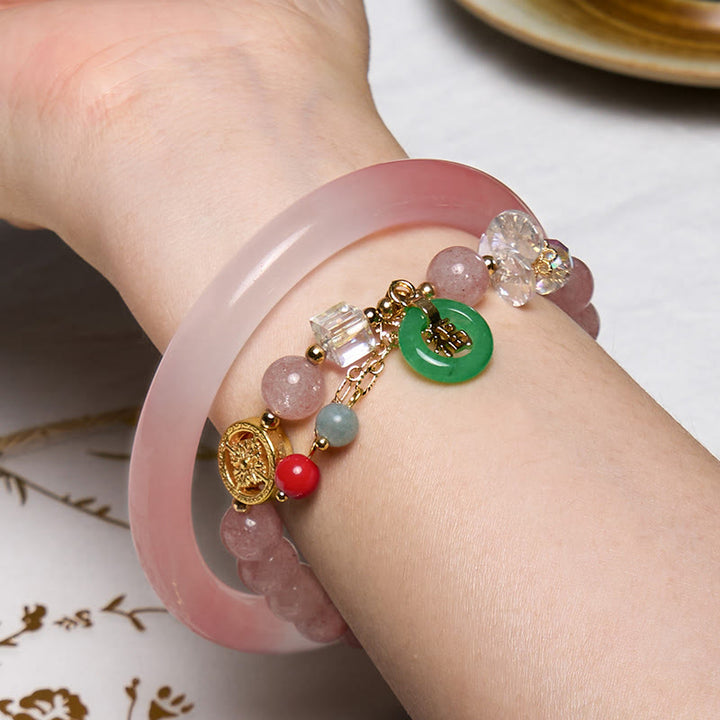 Buddha Stones Atraer amor y protección Pulsera rosa Paquete