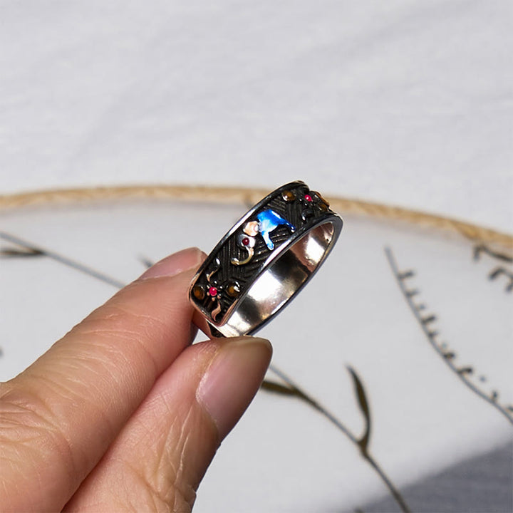 Anillo ajustable de fuerza con elefante tallado y colorido de Buddha Stones