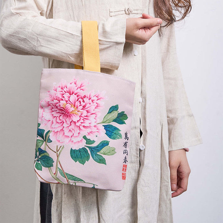 Bolso de lona con piedras de Buda y peonías