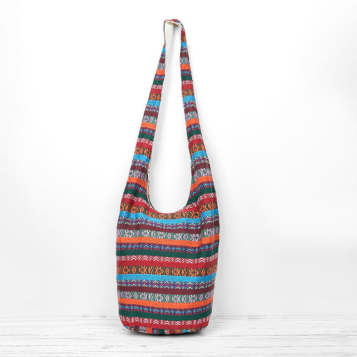 Bolso bandolera de algodón con patrón de rayas geométricas coloreadas Buddha Stones