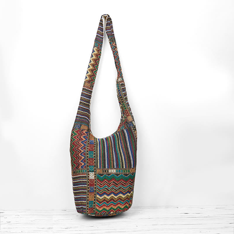 Bolso bandolera de algodón con patrón de olas verdes y marrones de Buddha Stones