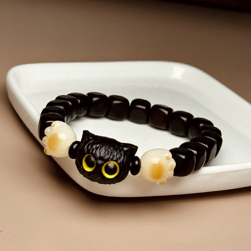 Buddha Stones Pulsera de Paz de Madera de Ébano con Semilla de Bodhi y Garra de Pata de Lindo Gato - Madera de ébano (circunferencia de la muñeca 14-16 cm) - image 1