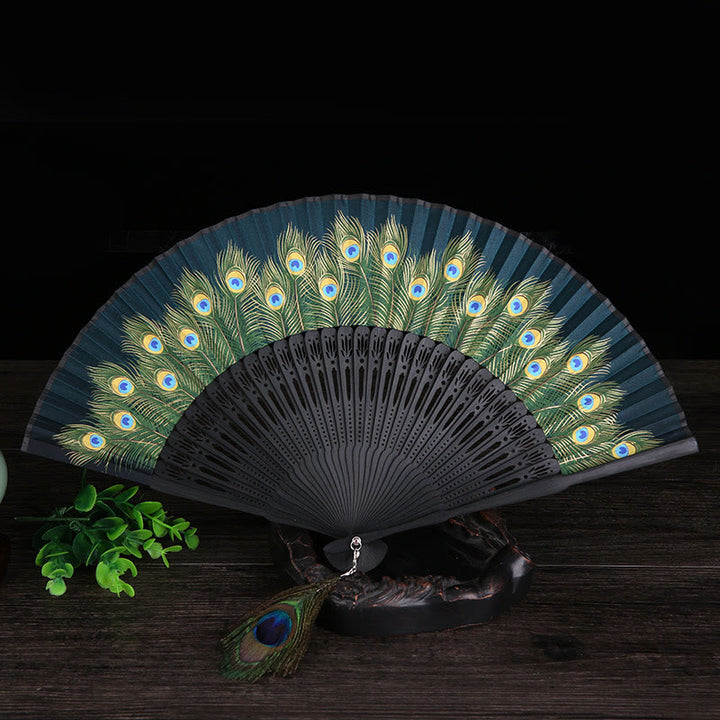 Buddha Stones Abanico Plegable de Bambu con Pluma de Pavo Real de 21.5cm