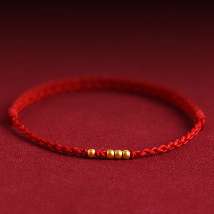 Pulsera de pareja de protección trenzada de la suerte con cuentas de oro 999 de piedras de Buddha Stones - Cuerda roja (una y tres cuentas doradas) - 24 cm - image 0