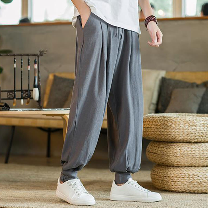 Buddha Stones Pantalones cónicos de algodón y lino para hombre en color liso verano con bolsillos - image 1