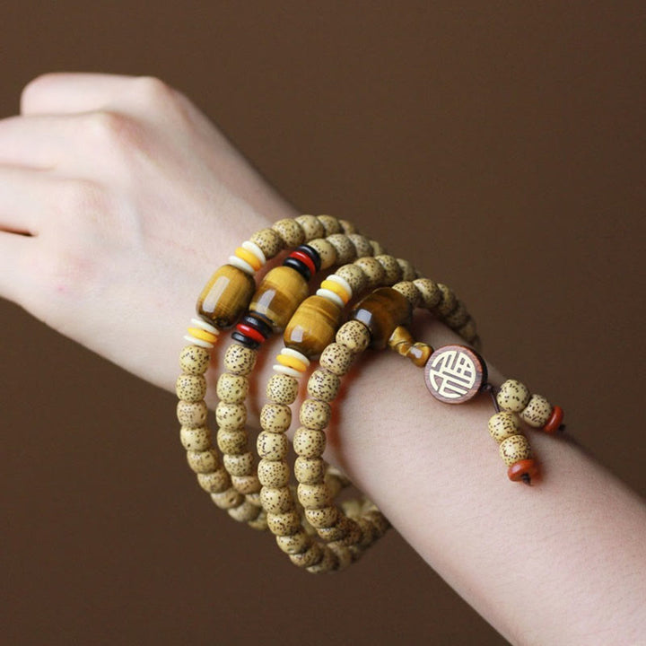 Buddha Stones 108 cuentas de mala semilla de Bodhi ojo de tigre carácter Fu pulsera de paz