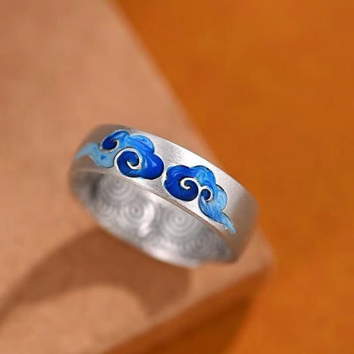 Anillo ajustable de cobre de riqueza con patrón de nubes auspiciosas azules de Buddha Stones