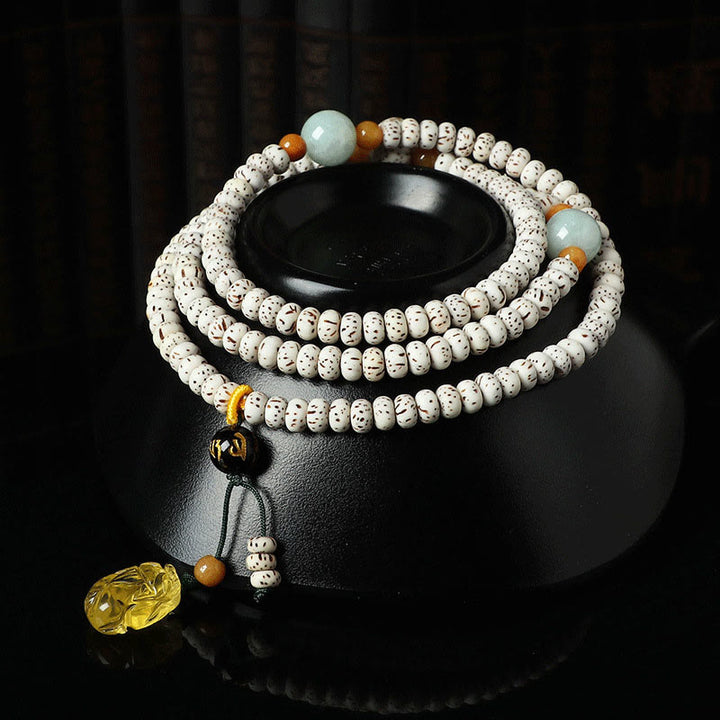 Pulsera de Buddha Stones de Semilla Bodhi Tibetana de Ámbar y Ágata para la Riqueza
