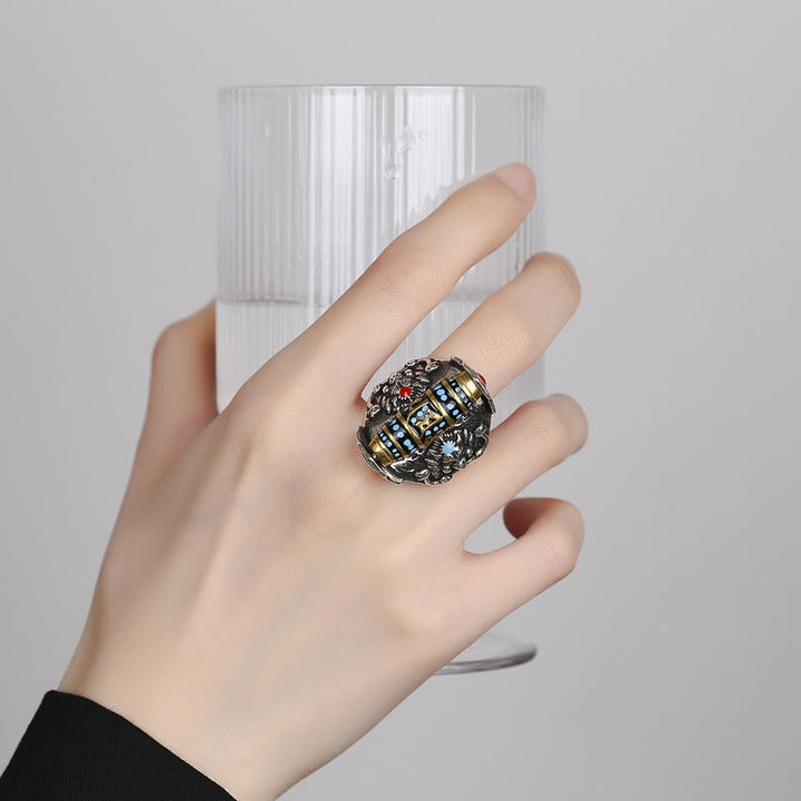 Buddha Stones Anillo giratorio de paz con patrón de cuentas Dzi tibetanas Om Mani Padme Hum de Garuda
