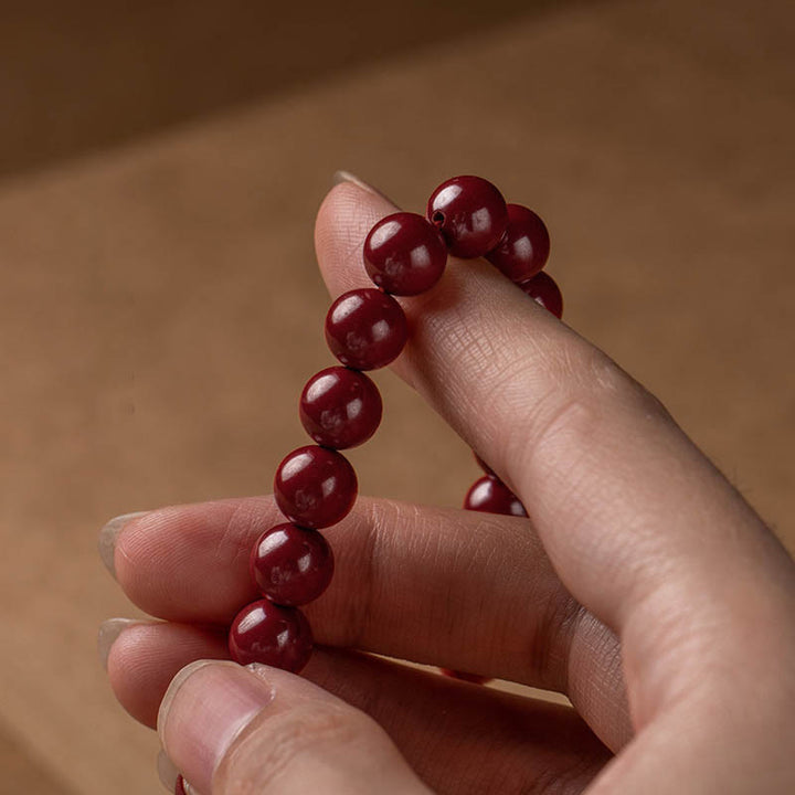 Pulsera de bendición de sutra de corazón de cinabrio natural con Buddha Stones