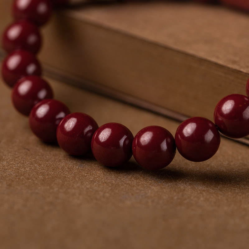 Pulsera de bendición de sutra de corazón de cinabrio natural con Buddha Stones
