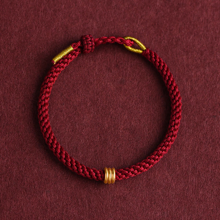 Pulsera de cuerda trenzada con diseño de triple anillo en oro 999 con Buddha Stones
