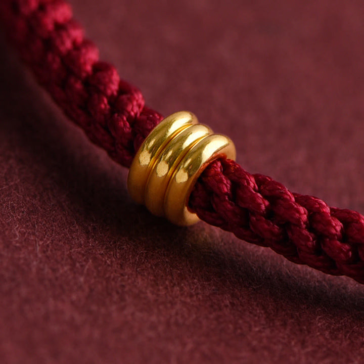 Pulsera de cuerda trenzada con diseño de triple anillo en oro 999 con Buddha Stones