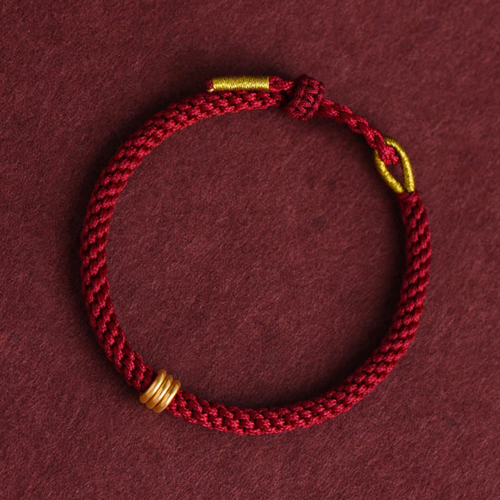 Pulsera de cuerda trenzada con diseño de triple anillo en oro 999 con Buddha Stones