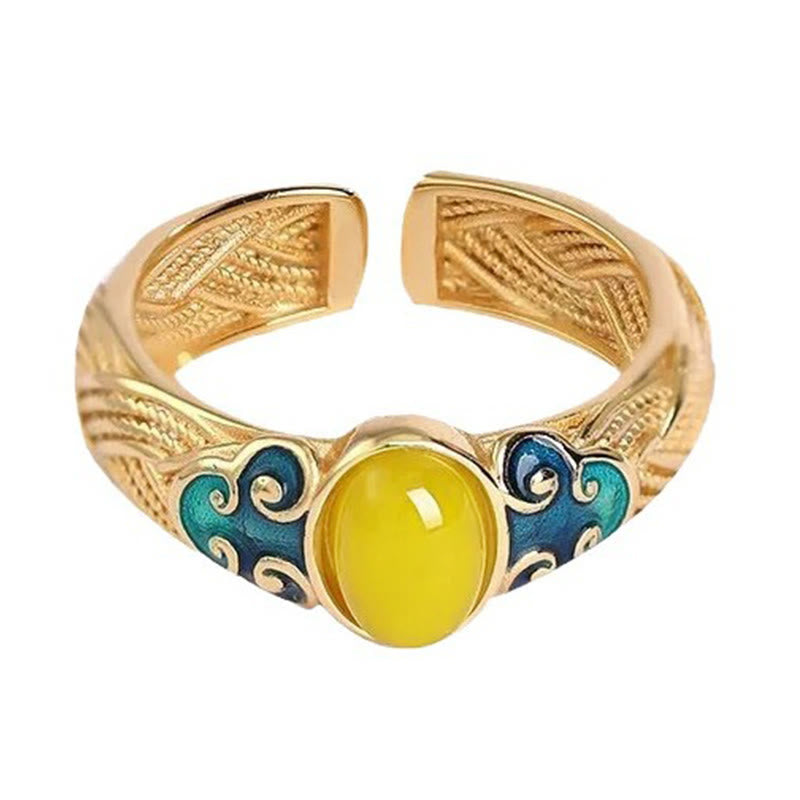 Anillo ajustable con nubes auspiciosas de cobre y ámbar con Buddha Stones