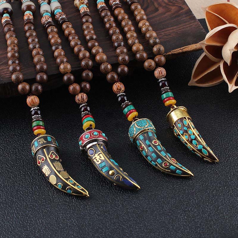 Colgante de collar con protección con diseño de cuerno de mantra con símbolo OM Om Mani Padme Hum de madera de wengué del Tíbet y Buddha Stones - image 1