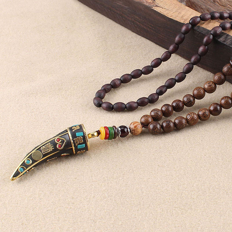 Colgante de collar con protección con diseño de cuerno de mantra con símbolo OM Om Mani Padme Hum de madera de wengué del Tíbet y Buddha Stones - Madera de wengué y Om Mani Padme Hum - image 1