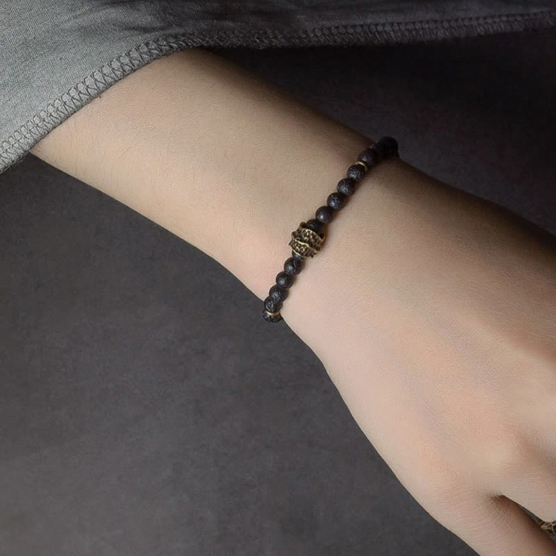 Pulsera de cobre con cuentas de lava y Buddha Stones que ayudan a la curación