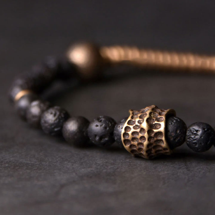Pulsera de cobre con cuentas de lava y Buddha Stones que ayudan a la curación
