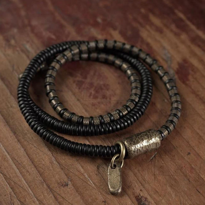 Pulsera de cobre multicapa con cuentas de madera de ébano tibetano y Buddha Stones
