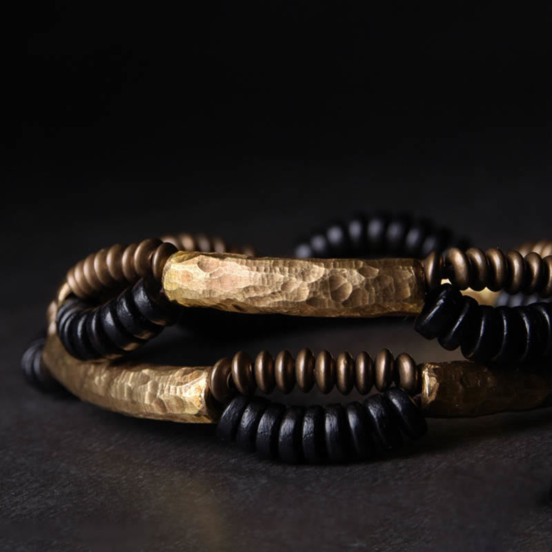 Pulsera hecha a mano con Buddha Stones, madera de ébano vintage, cobre, suerte y riqueza