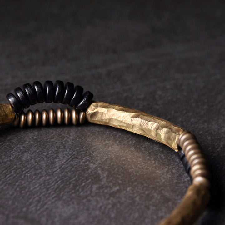 Pulsera hecha a mano con Buddha Stones, madera de ébano vintage, cobre, suerte y riqueza