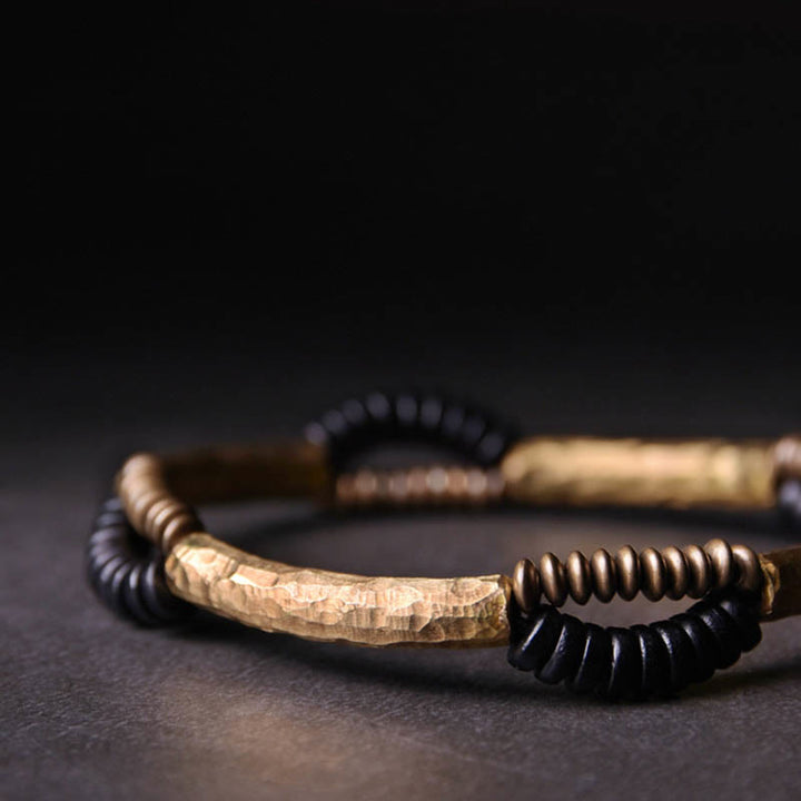 Pulsera hecha a mano con Buddha Stones, madera de ébano vintage, cobre, suerte y riqueza