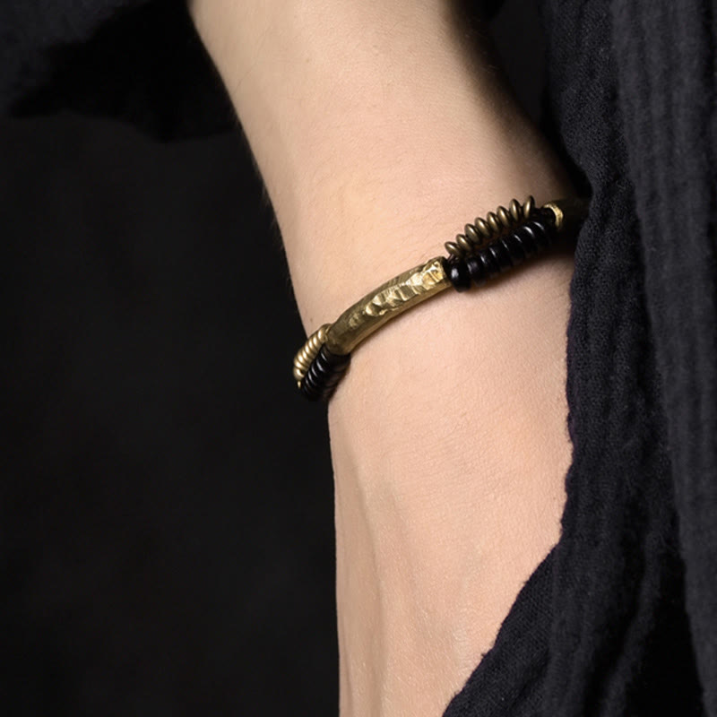 Pulsera hecha a mano con Buddha Stones, madera de ébano vintage, cobre, suerte y riqueza