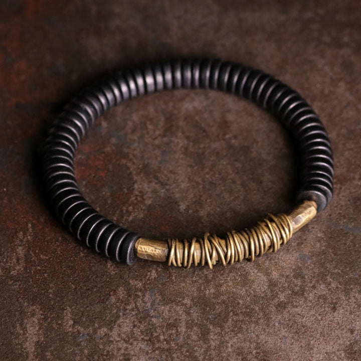 Pulsera de cobre y madera de ébano tibetano con Buddha Stones