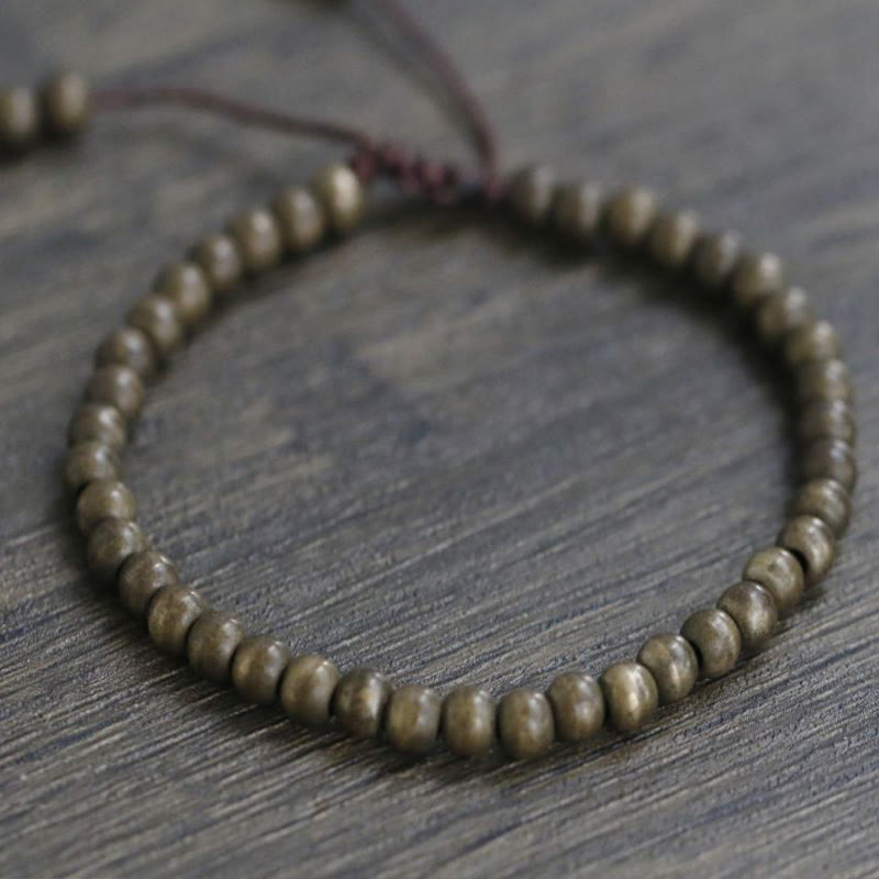Pulsera sencilla de equilibrio de riqueza con cuentas de cobre y latón y Buddha Stones