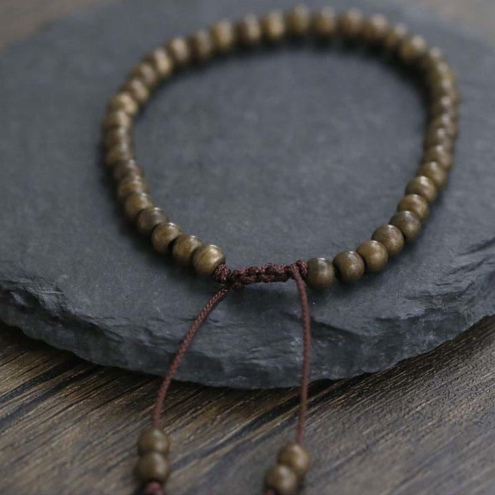 Pulsera sencilla de equilibrio de riqueza con cuentas de cobre y latón y Buddha Stones