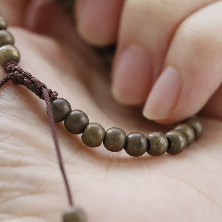 Pulsera sencilla de equilibrio de riqueza con cuentas de cobre y latón y Buddha Stones
