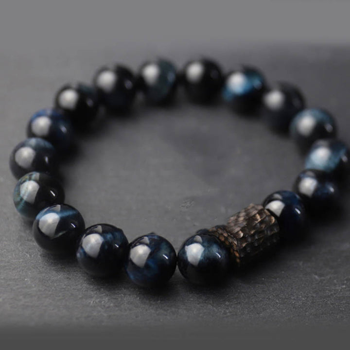 Pulsera de cuentas de madera de ébano y ojo de tigre con Buddha Stones