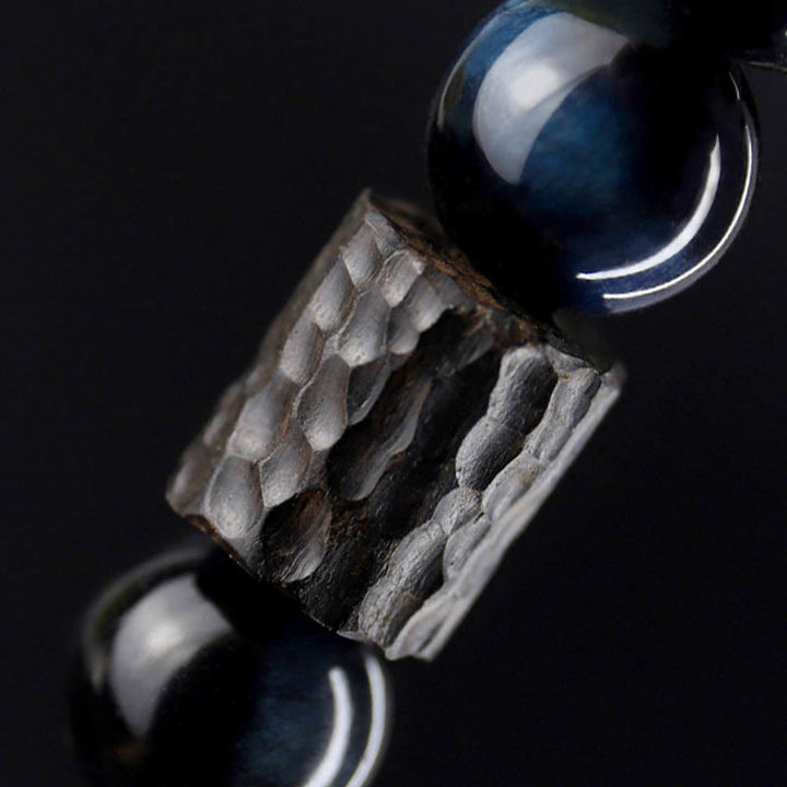 Pulsera de cuentas de madera de ébano y ojo de tigre con Buddha Stones