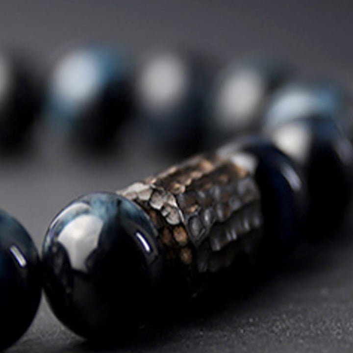 Pulsera de cuentas de madera de ébano y ojo de tigre con Buddha Stones