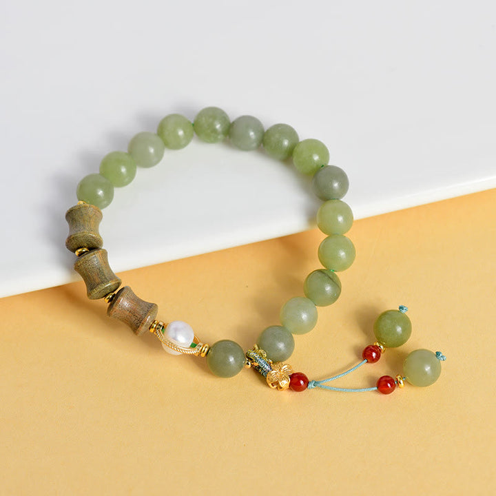 Pulsera de prosperidad con Buddha Stones, jade, sándalo, bambú y perla