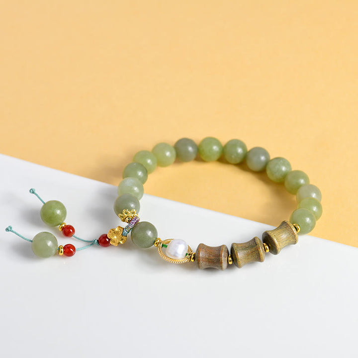 Pulsera de prosperidad con Buddha Stones, jade, sándalo, bambú y perla