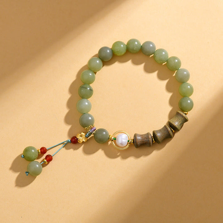 Pulsera de prosperidad con Buddha Stones, jade, sándalo, bambú y perla