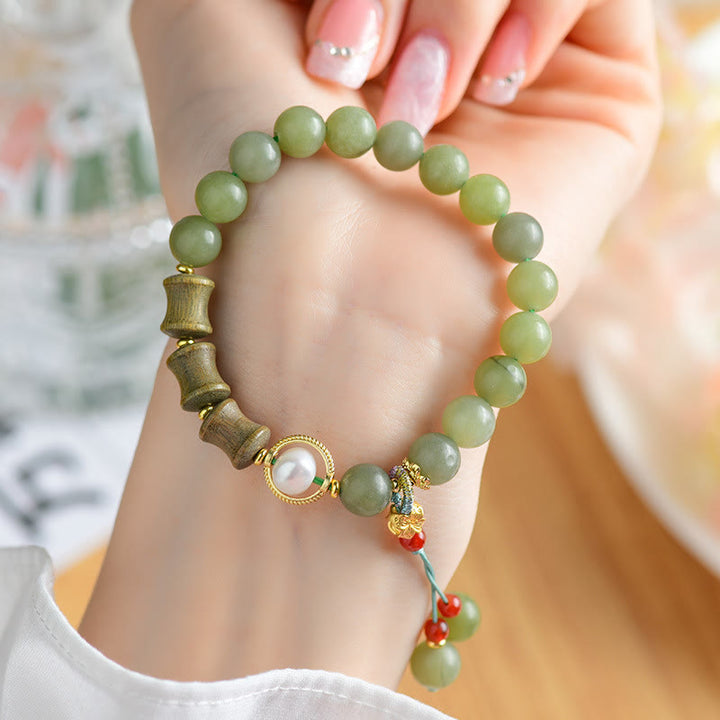 Pulsera de prosperidad con Buddha Stones, jade, sándalo, bambú y perla