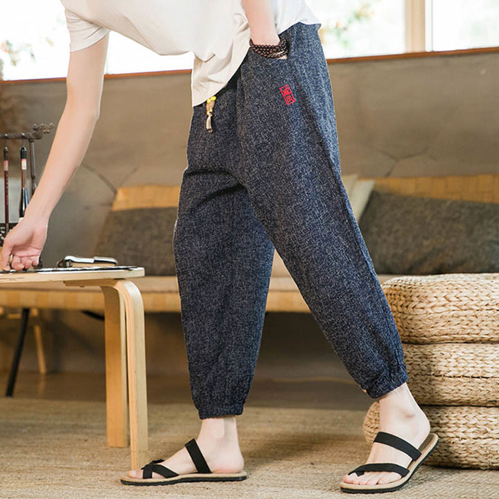 Pantalones harén de algodón con cordón y bolsillos para hombre con Buddha Stones