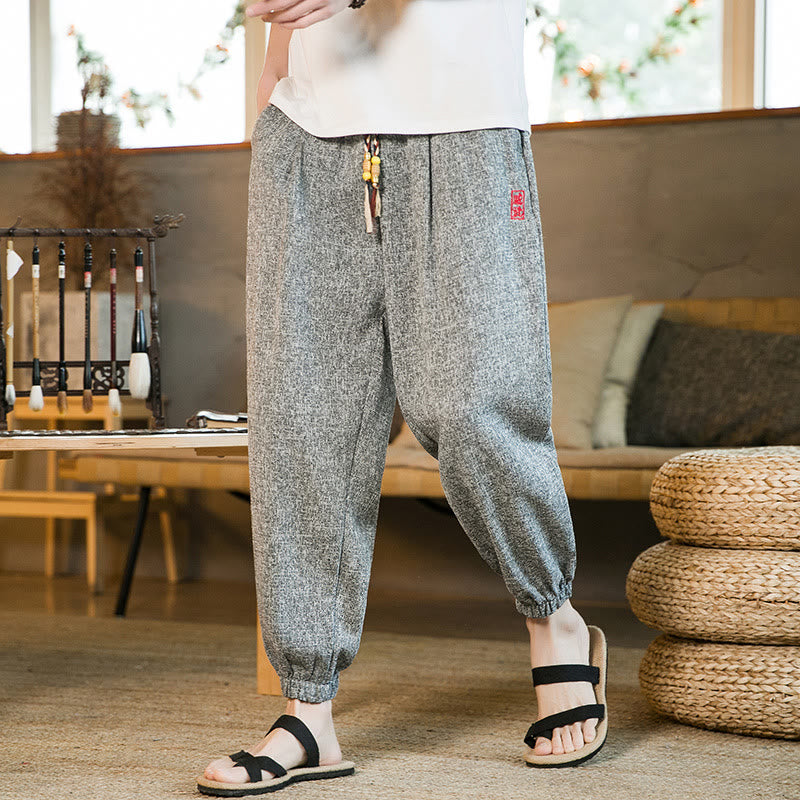 Pantalones harén de algodón con cordón y bolsillos para hombre con Buddha Stones