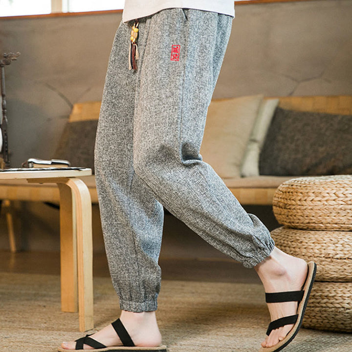 Pantalones harén de algodón con cordón y bolsillos para hombre con Buddha Stones