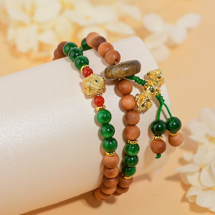 Pulsera de protección y curación con diseño de doble torsión de Dorje Vajra del Tíbet con cuentas de madera de sándalo y Buddha Stones