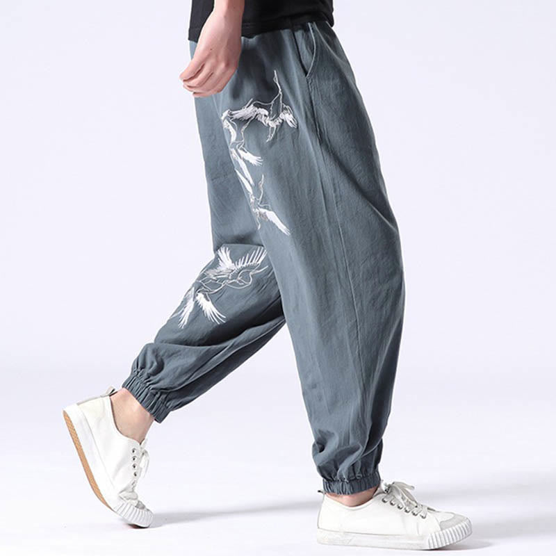 Pantalones harén con cordón y bolsillos para hombre con diseño bordado de grulla blanca y Buddha Stones - image 1
