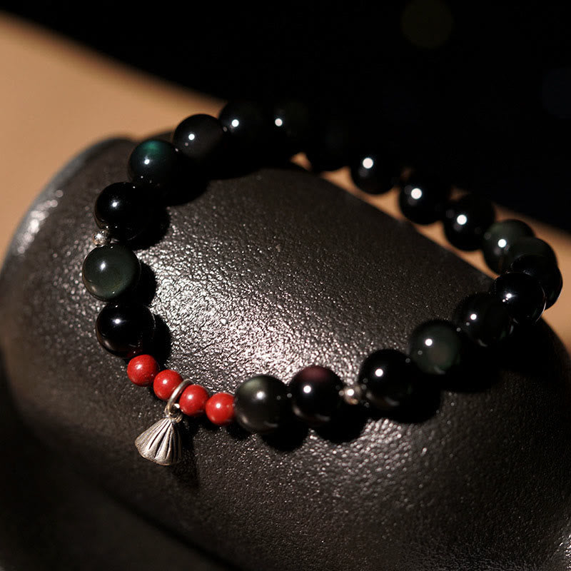 Pulsera de poder con dije de loto de cinabrio y obsidiana negra natural de Buddha Stones