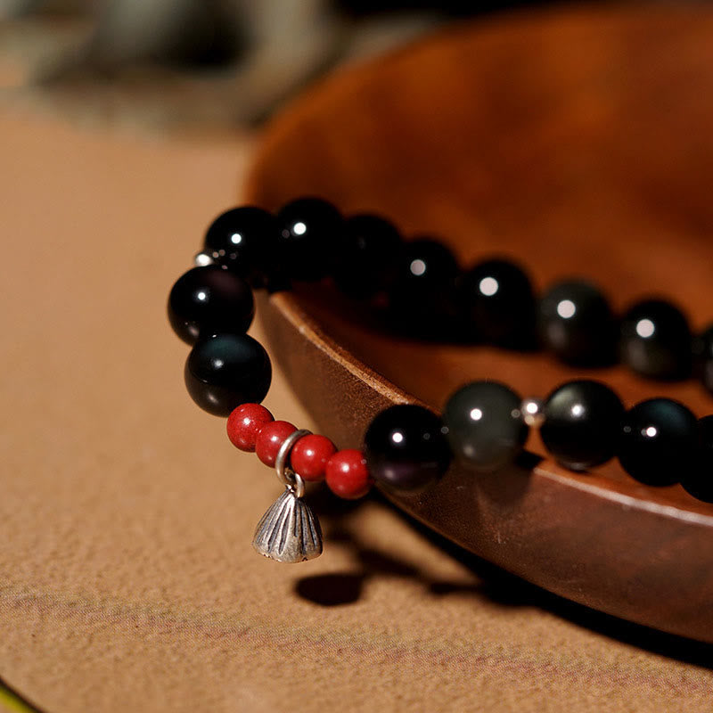 Pulsera de poder con dije de loto de cinabrio y obsidiana negra natural de Buddha Stones
