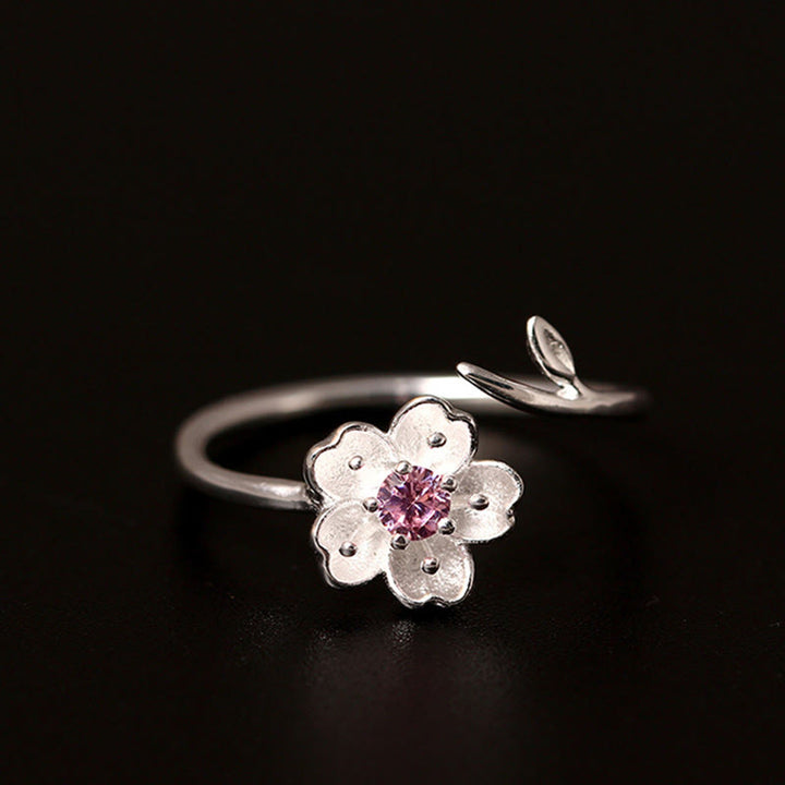 Anillo ajustable con bendición de flor de cerezo y sakura en plata de ley 925 con Buddha Stones