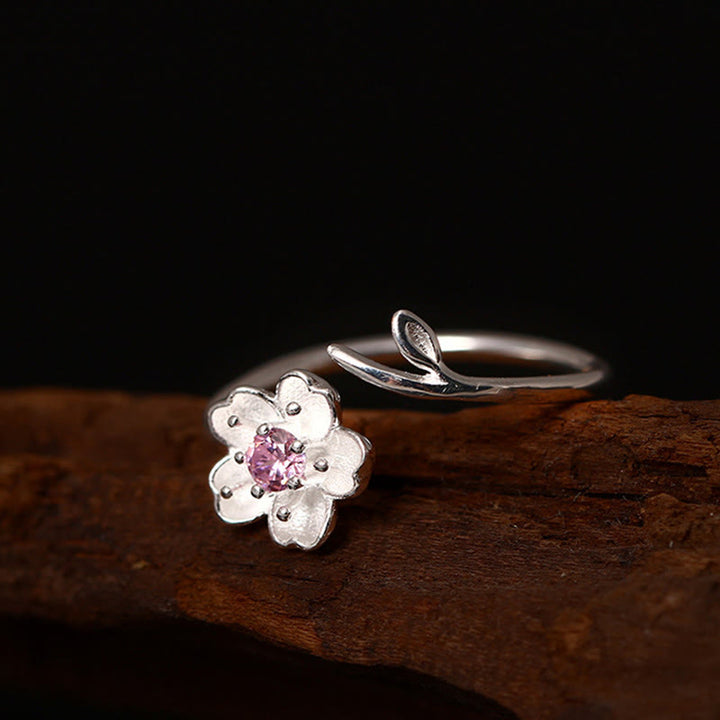 Anillo ajustable con bendición de flor de cerezo y sakura en plata de ley 925 con Buddha Stones