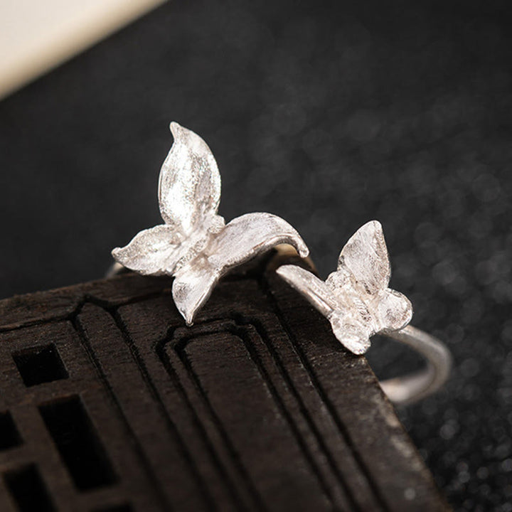 Anillo de mariposa con Buddha Stones en plata de ley 925
