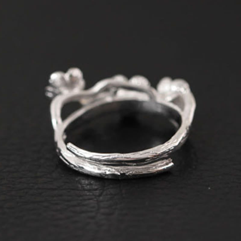 Anillo de plata de ley 925 con Buddha Stones y calma en el seno del ciruelo